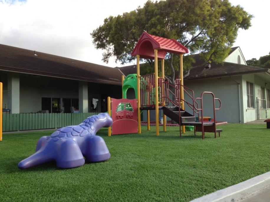 Southwest-Greens-play-area-playground-safety-surface-fake-grass-lawn-2