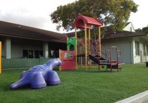 Southwest Greens play area playground safety surface fake grass lawn 2